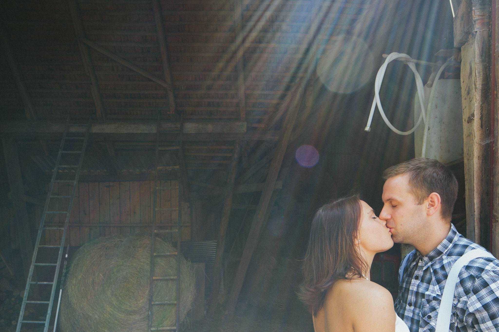 Swedish couple sun flare kiss