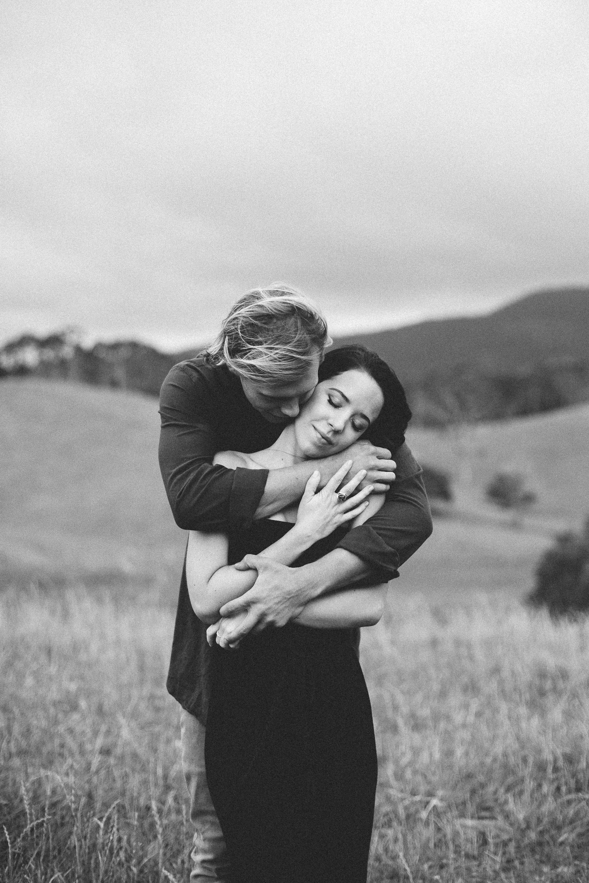 together warm hug couple photoshoot