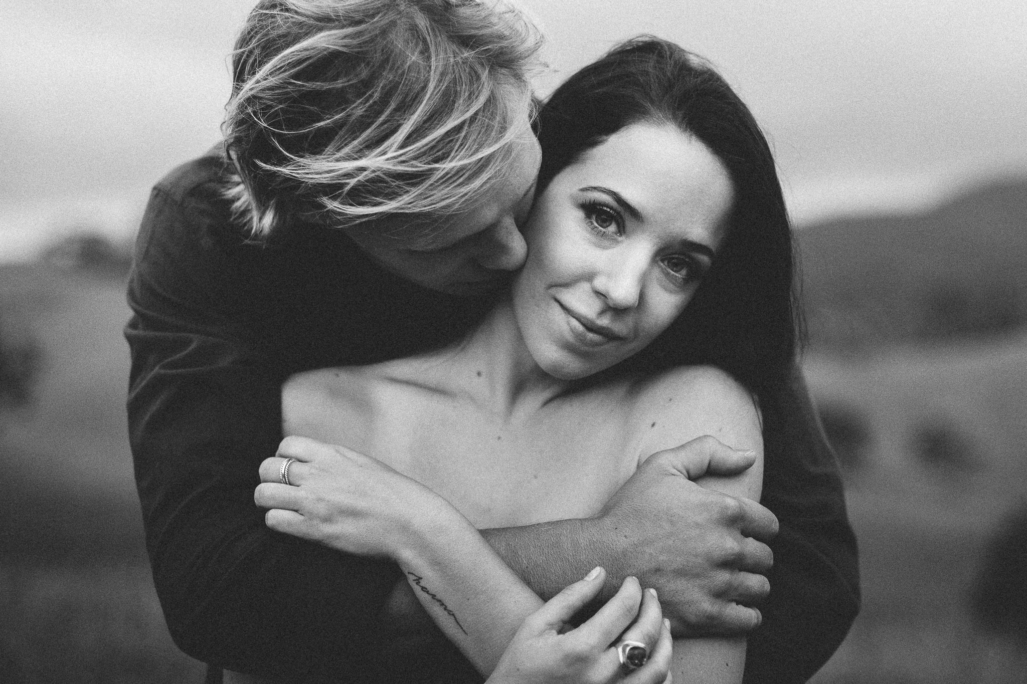 him hugging her couple