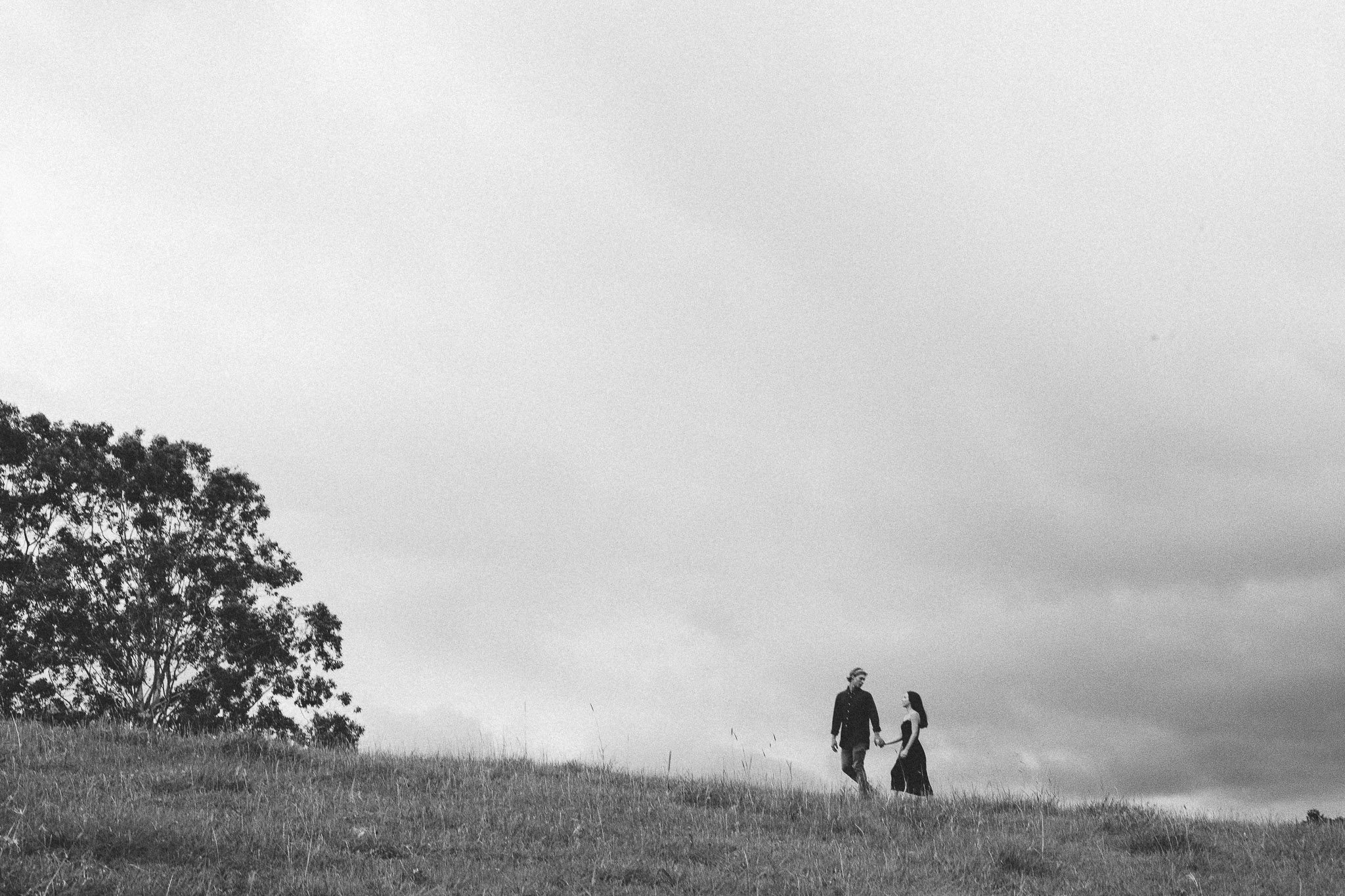 holding hands walking couple