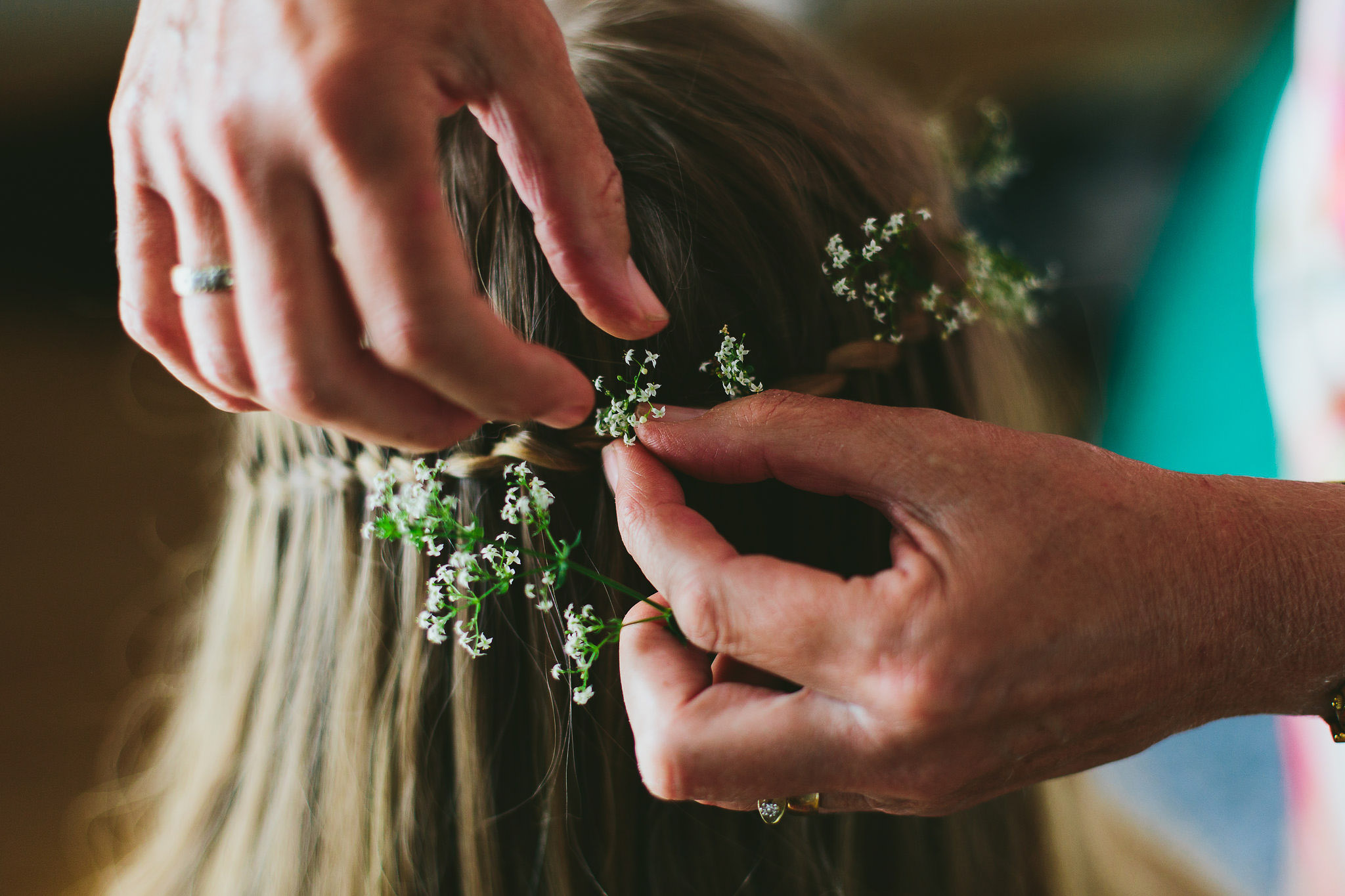 hairdresser flower in brides hair