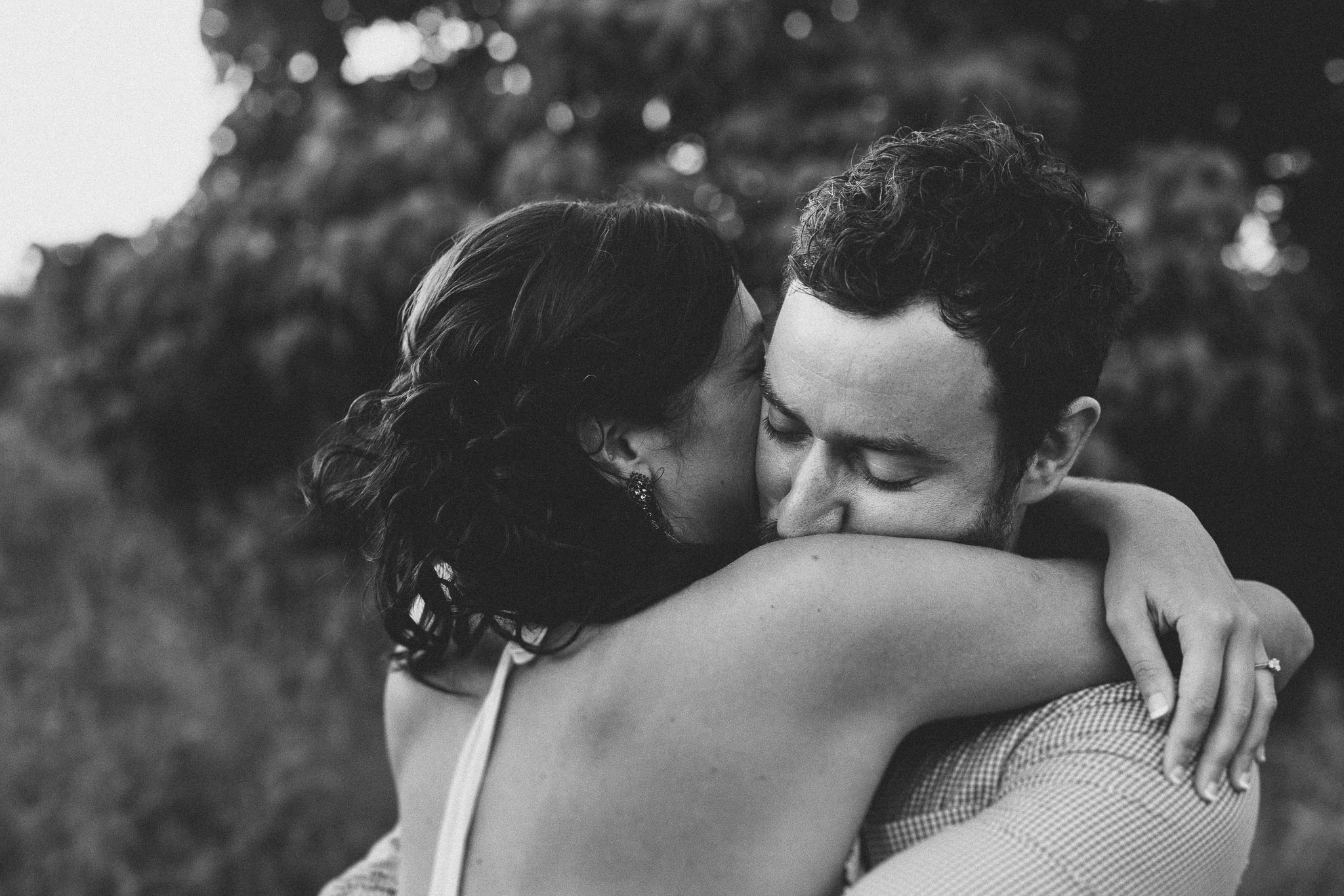 Fingal beach photo shoot couple hugging