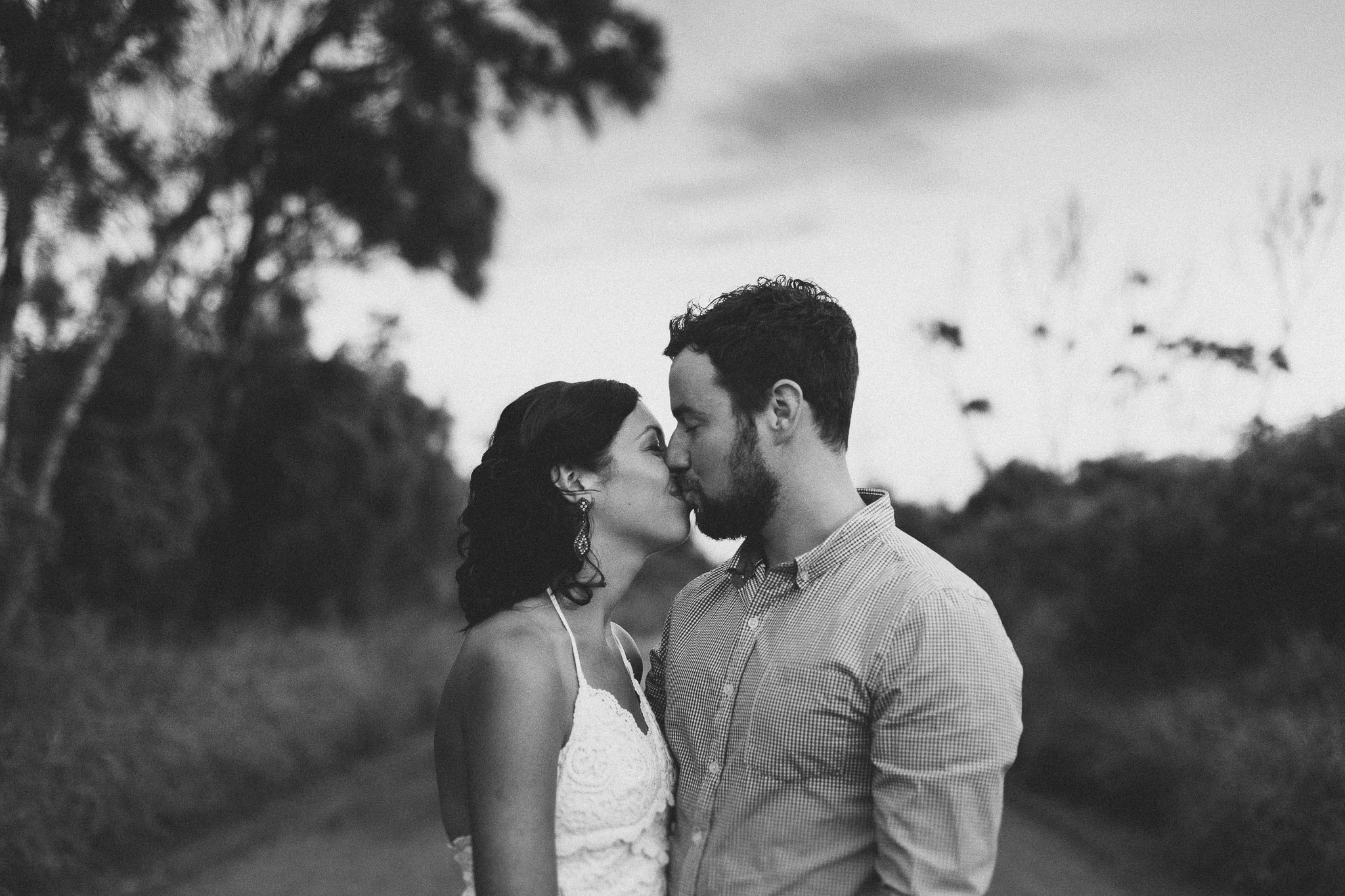 engagement photo shoot black and white kiss