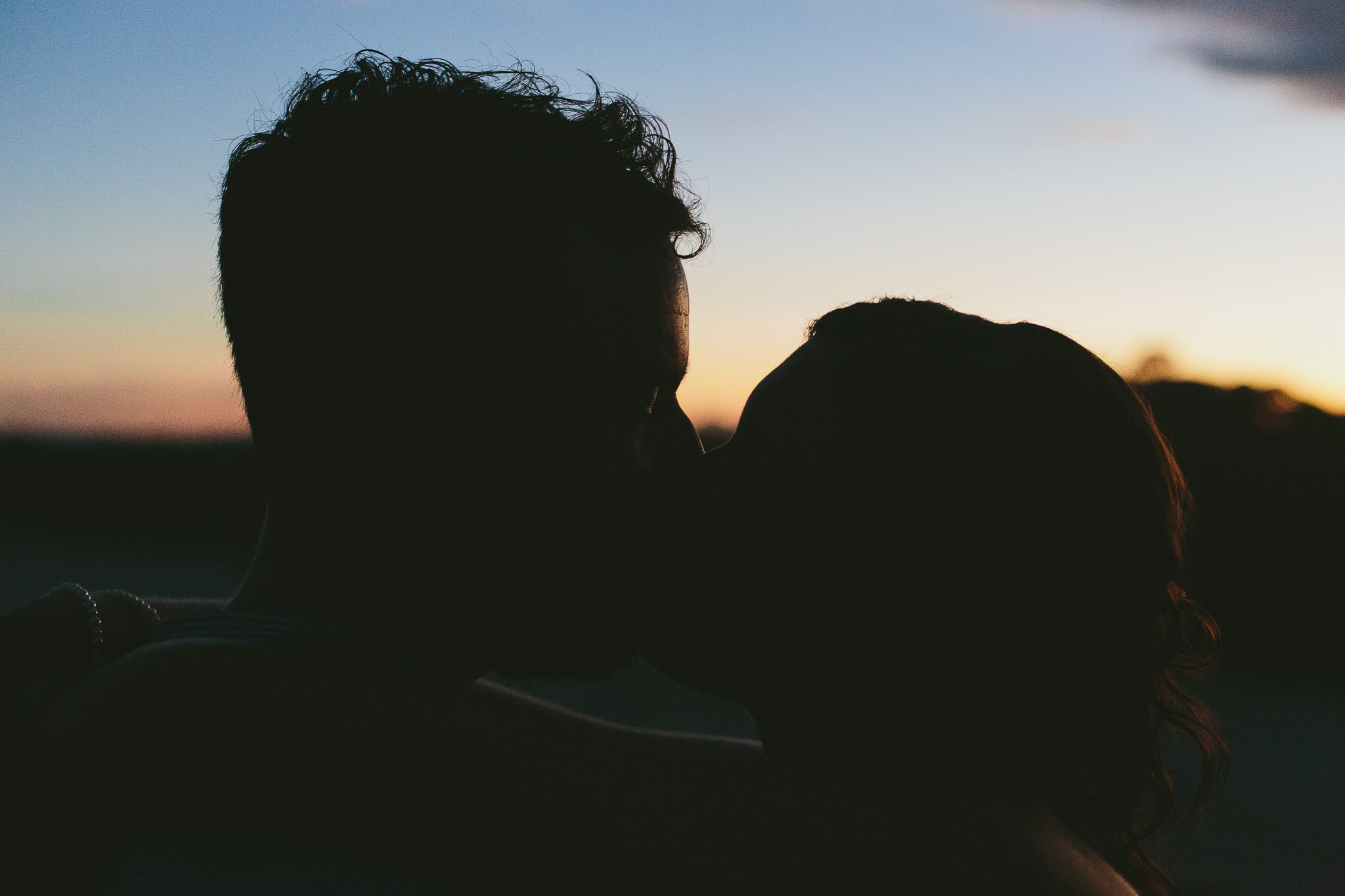 kiss sunset Fingal headland engagement photo shoot 