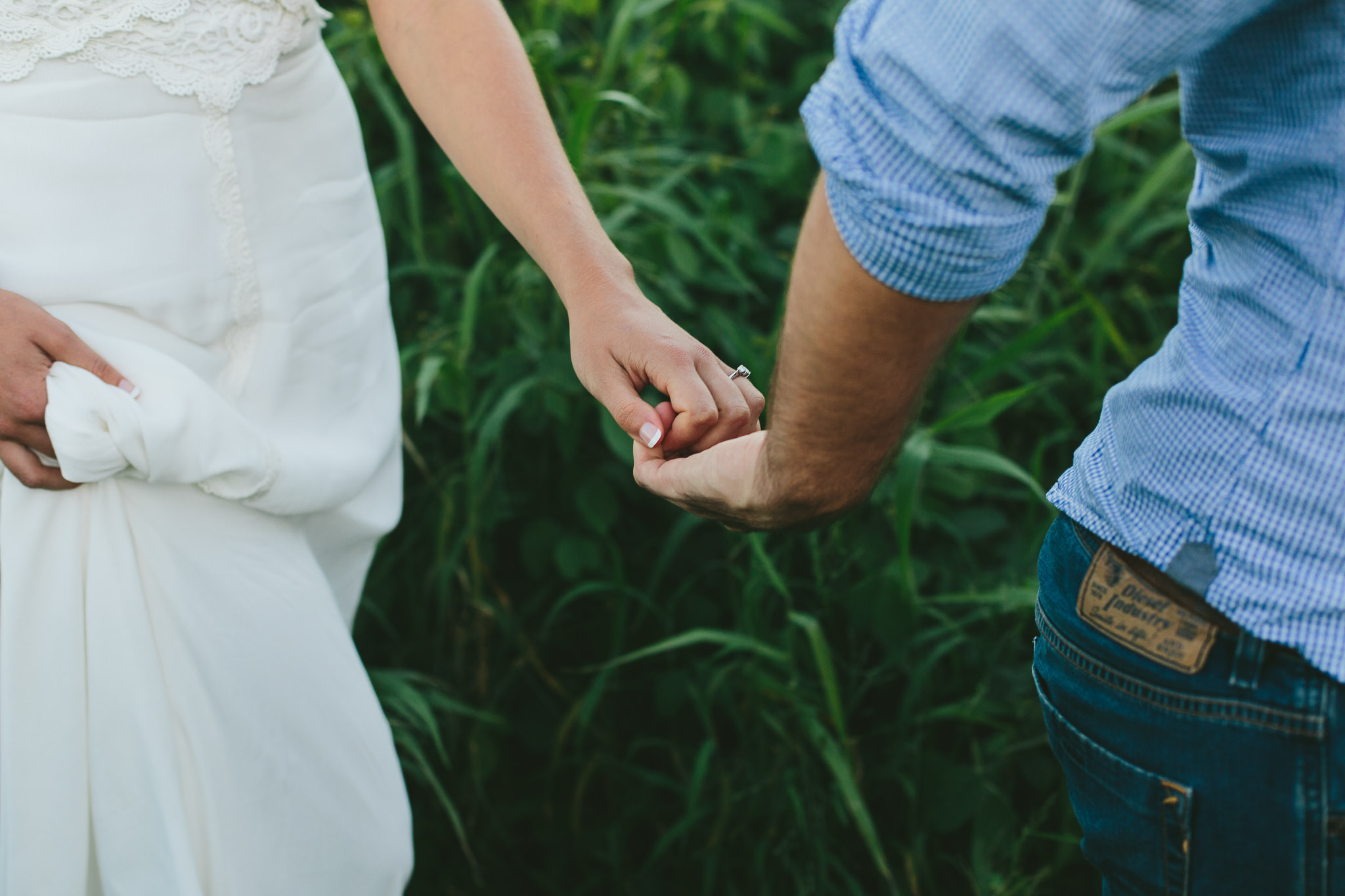 engagement photo shoot couple holding hands