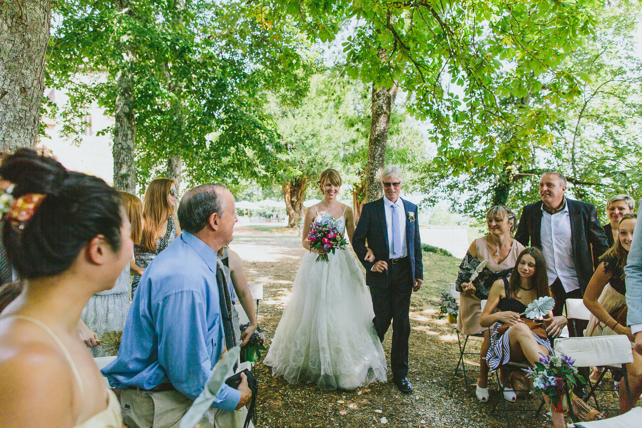 French professional wedding photographer father walking daughter down the aisle