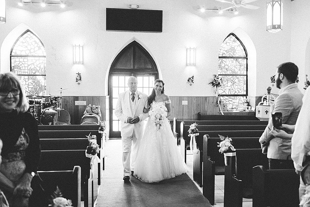 Bahamian bride and farther down the aisle