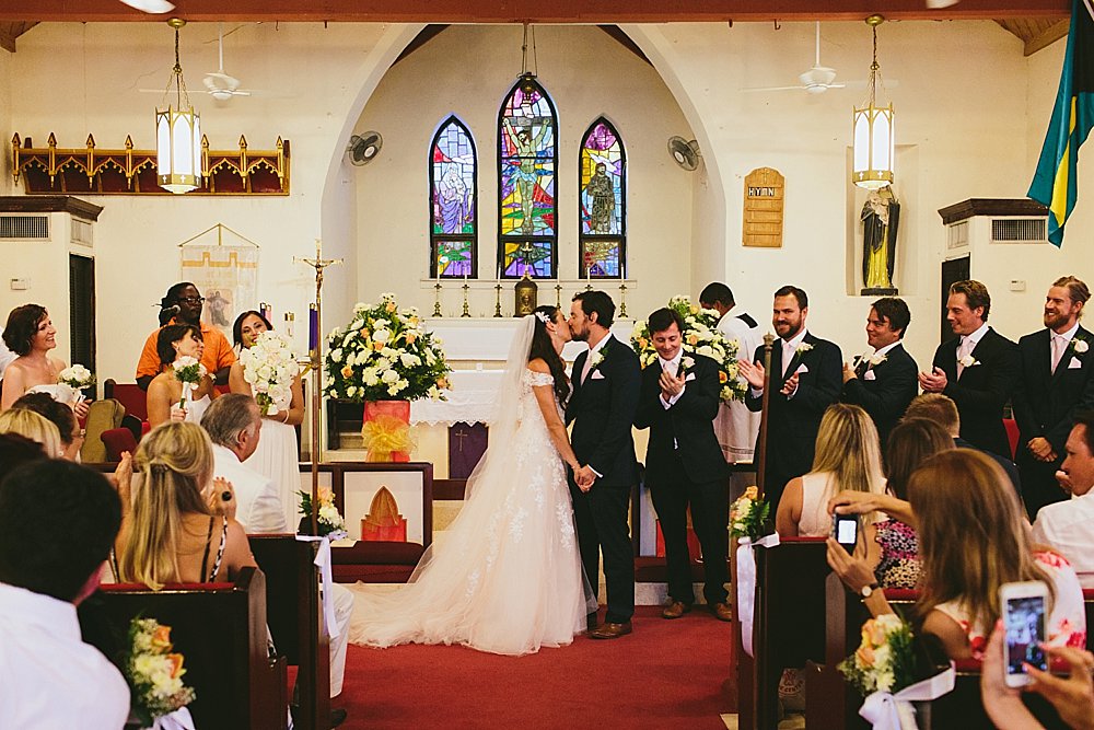 Bahamian wedding church kiss