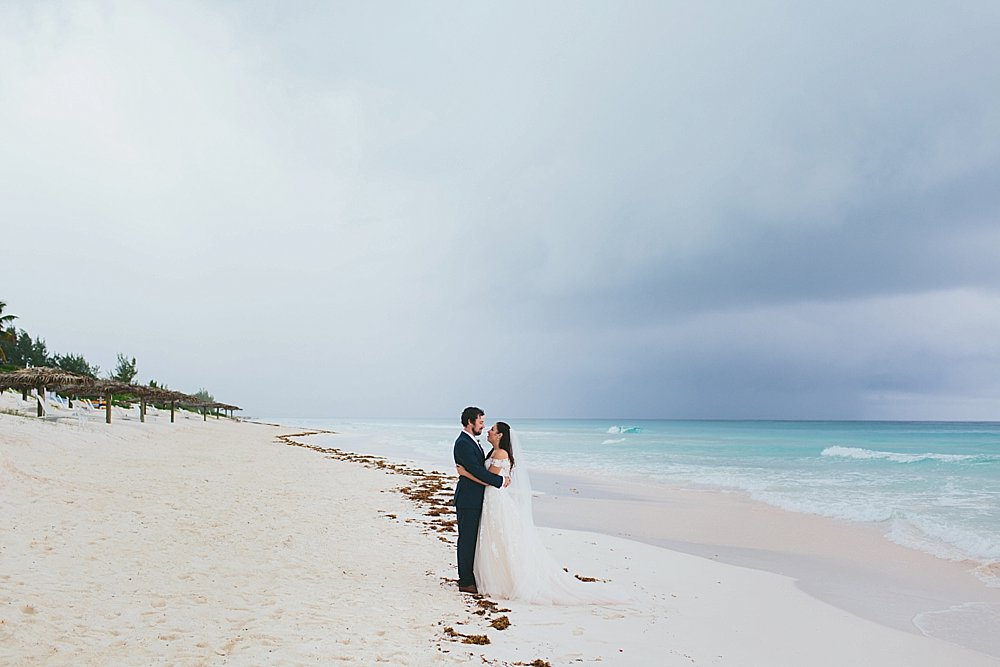 Bahamian wedding bride and groom photo session on the beach