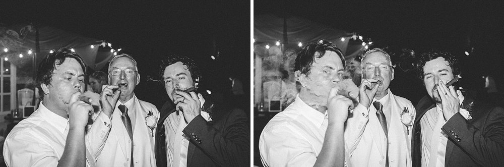 Bahamian wedding groomsman and groom cigar smoking