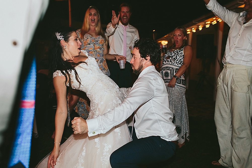 Bahamian wedding enjoy bride and groom fun dancing