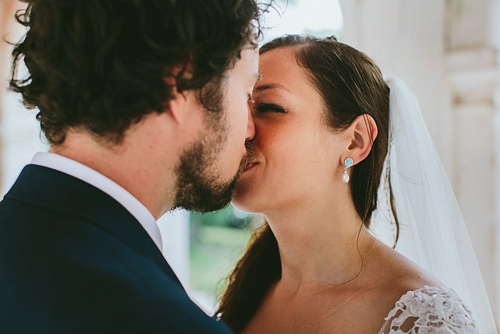 Bahamian wedding bride and groom kiss