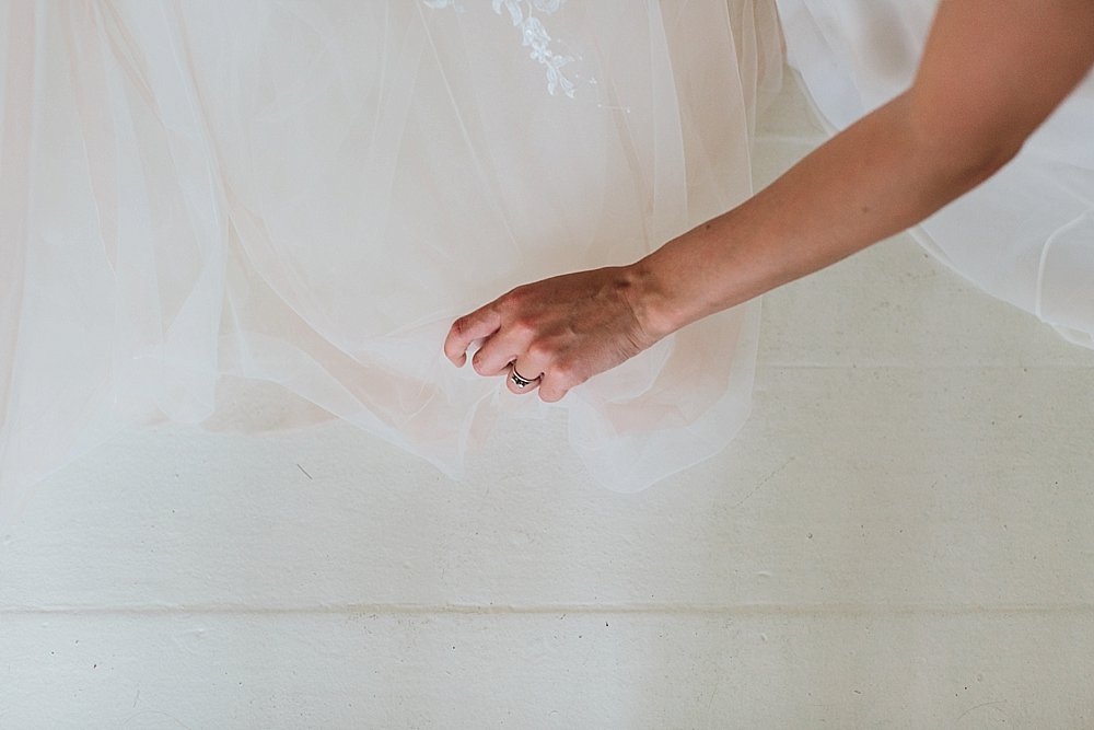 Bahamian bride and bridesmaids dress detail hands