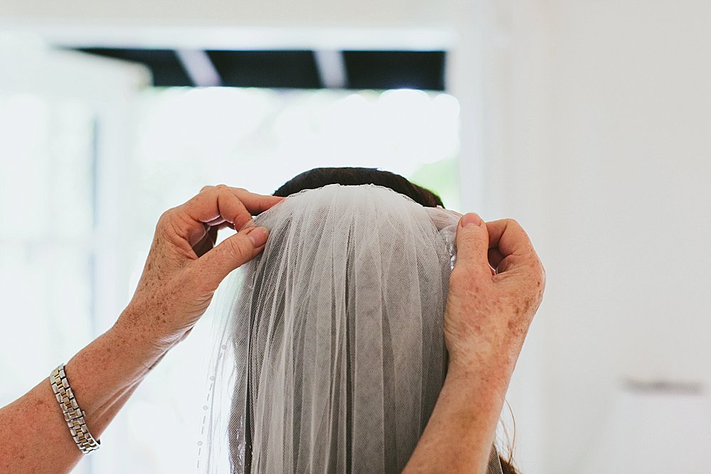 Bahamian bride and bridesmaids veil