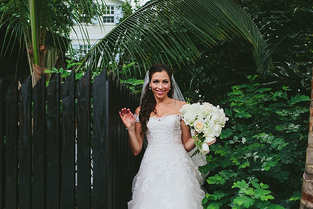 Bahamian bride on the way to church smiles