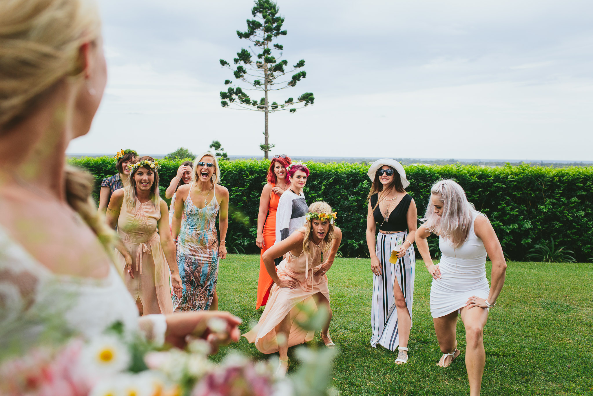 Byron Bay weddings ladies ready to catch wedding bouquet