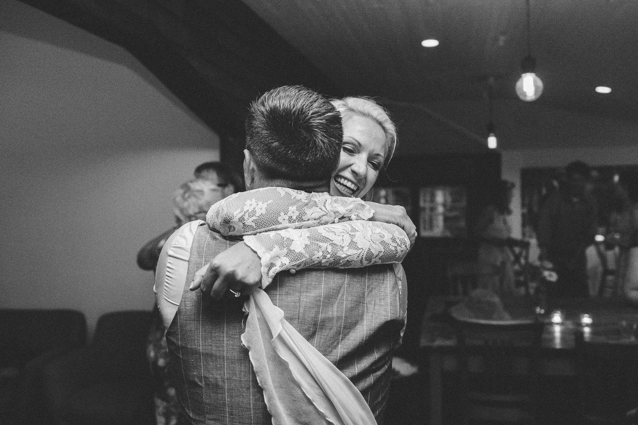 Byron Bay weddings bride and groom hugging on the dance floor
