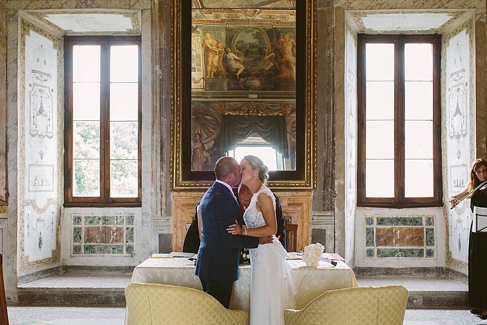 Rome wedding ceremony kiss