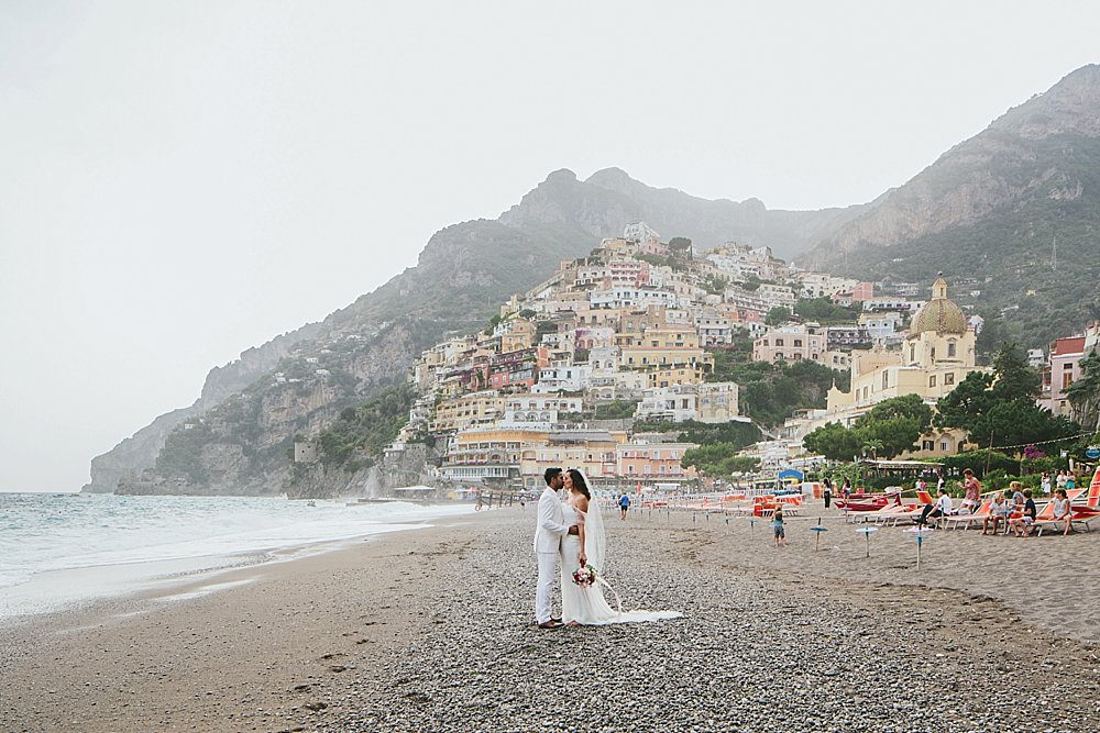 Positano wedding kiss on the beach