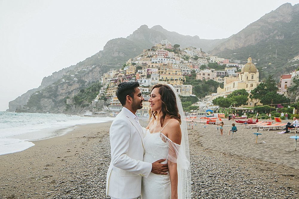 Positano wedding bride and groom on the beach