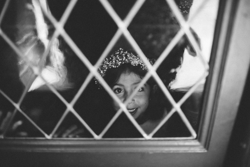 portrait flower girl through glass