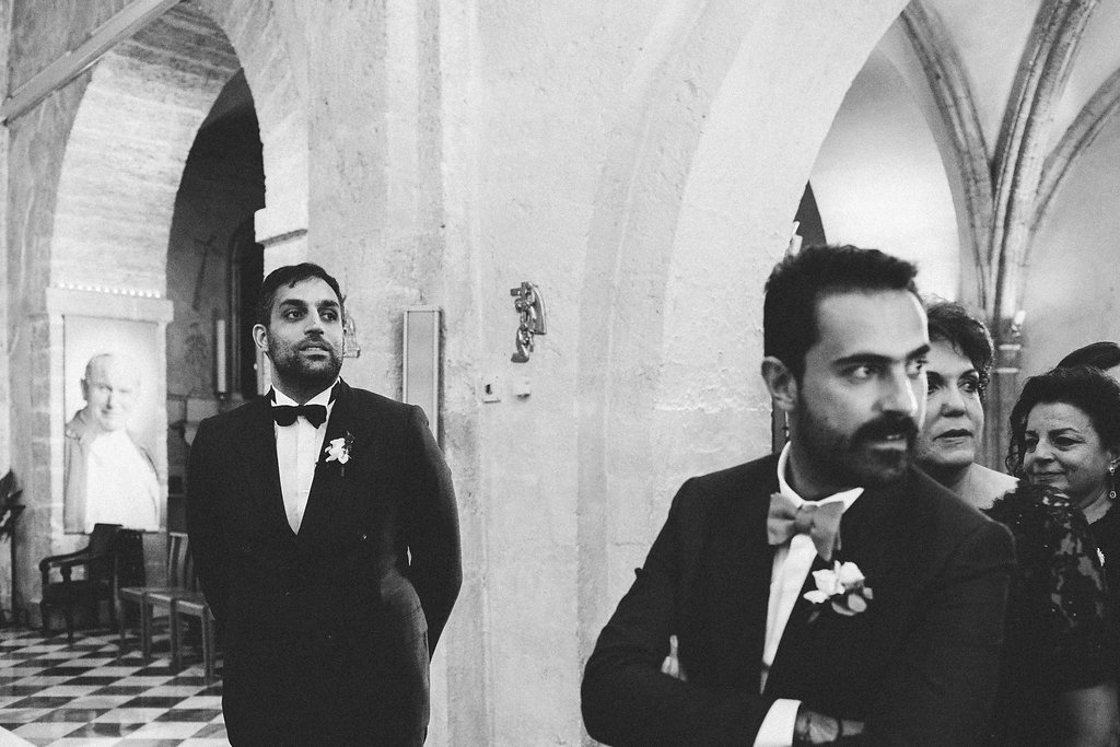 groom waiting for bride church