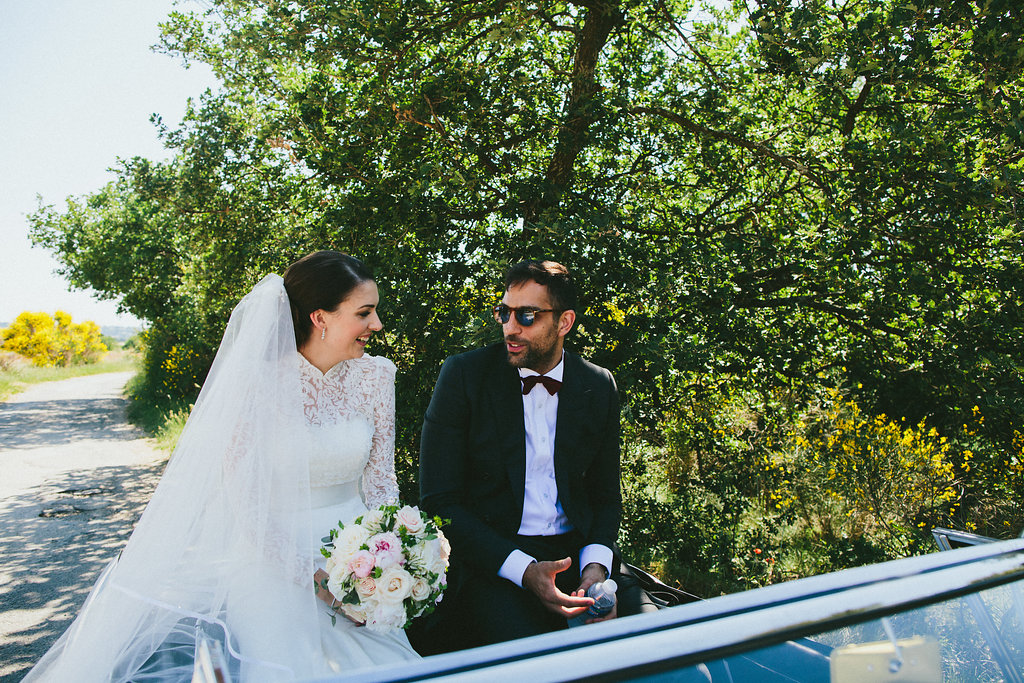 Bride and groom wedding car