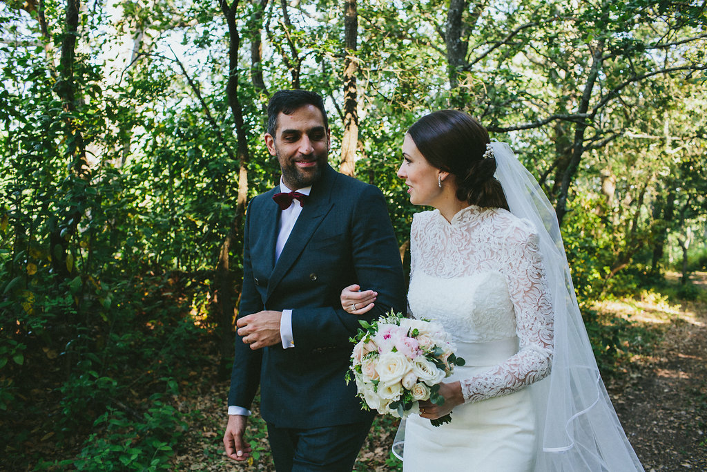 Provence wedding bride and groom walking in woods