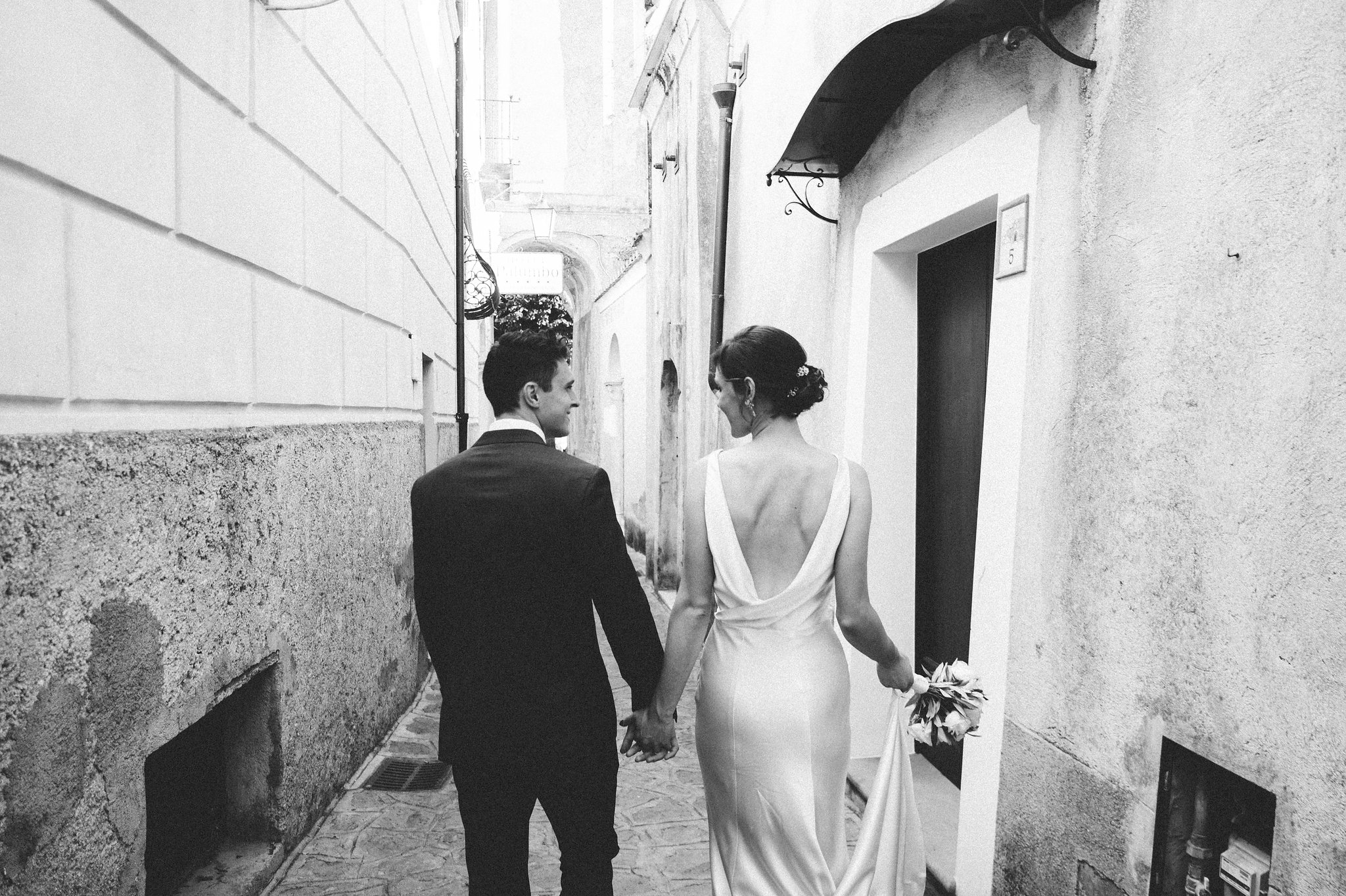 Italian weddings Bride and groom hand in hand Ravello Amalfi