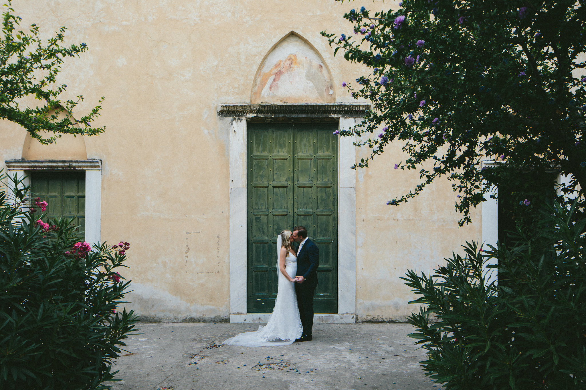 kissing outside church doors 