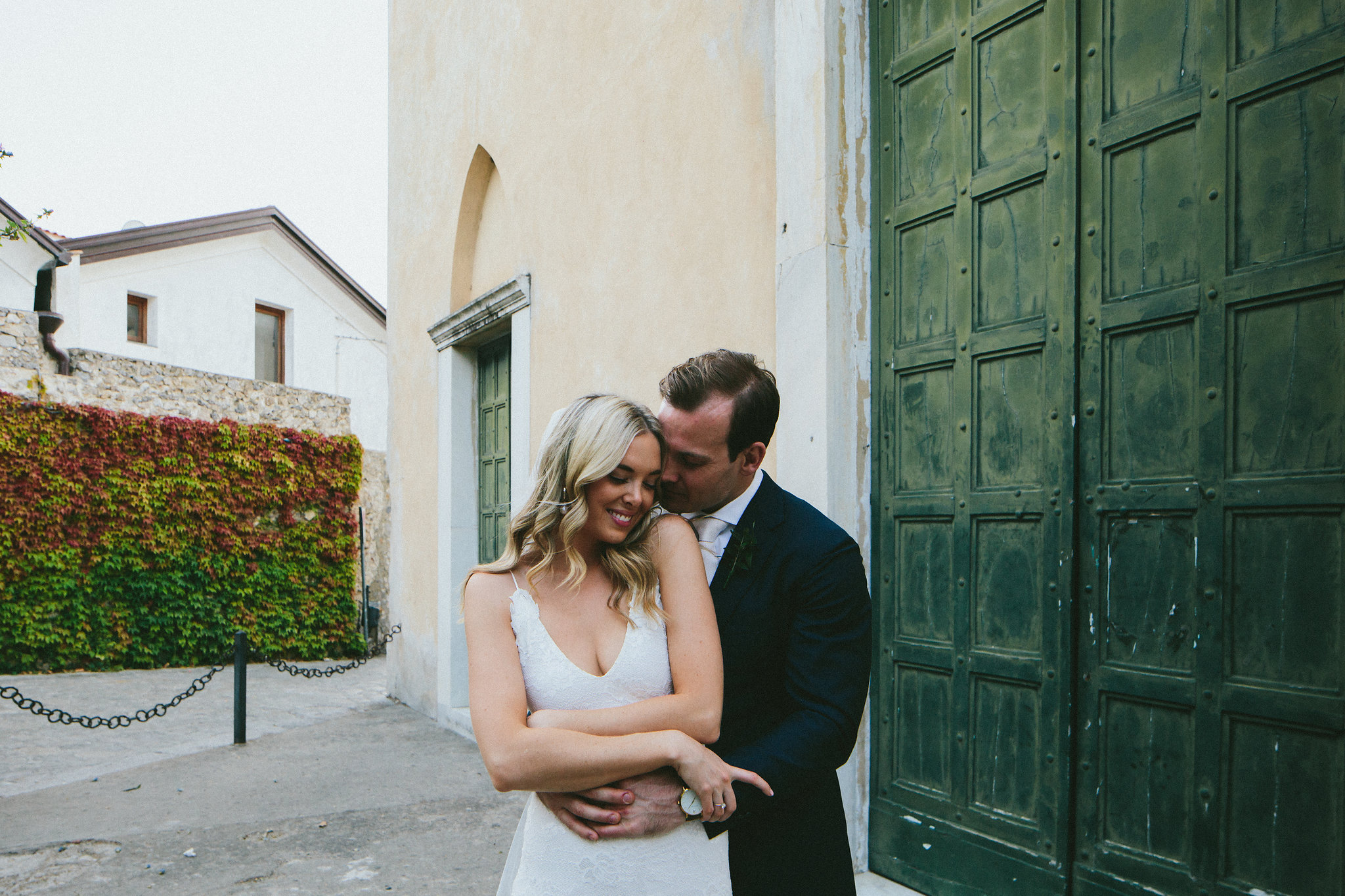 groom holding his bride