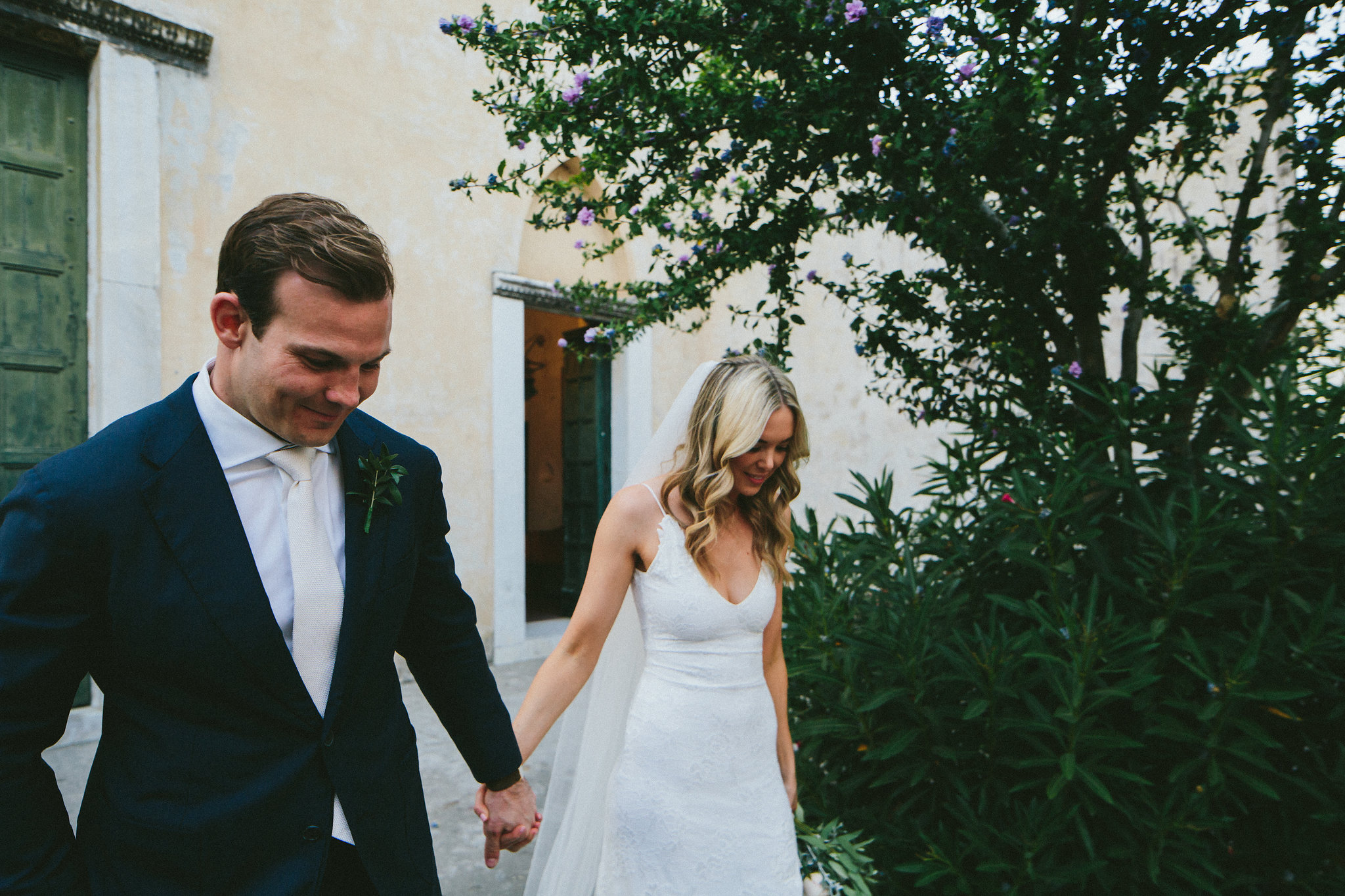 Bride and Groom walk in the streets of Ravello Italy