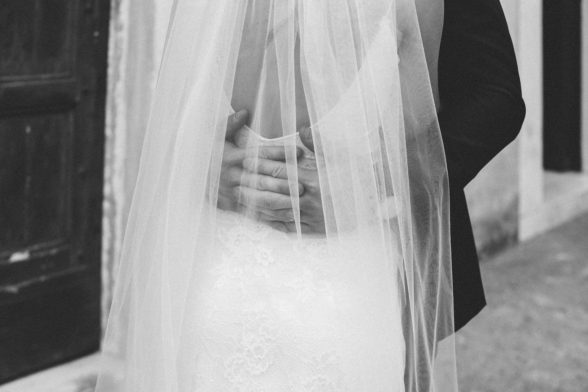 Groom holds bride close Ravello Italy wedding