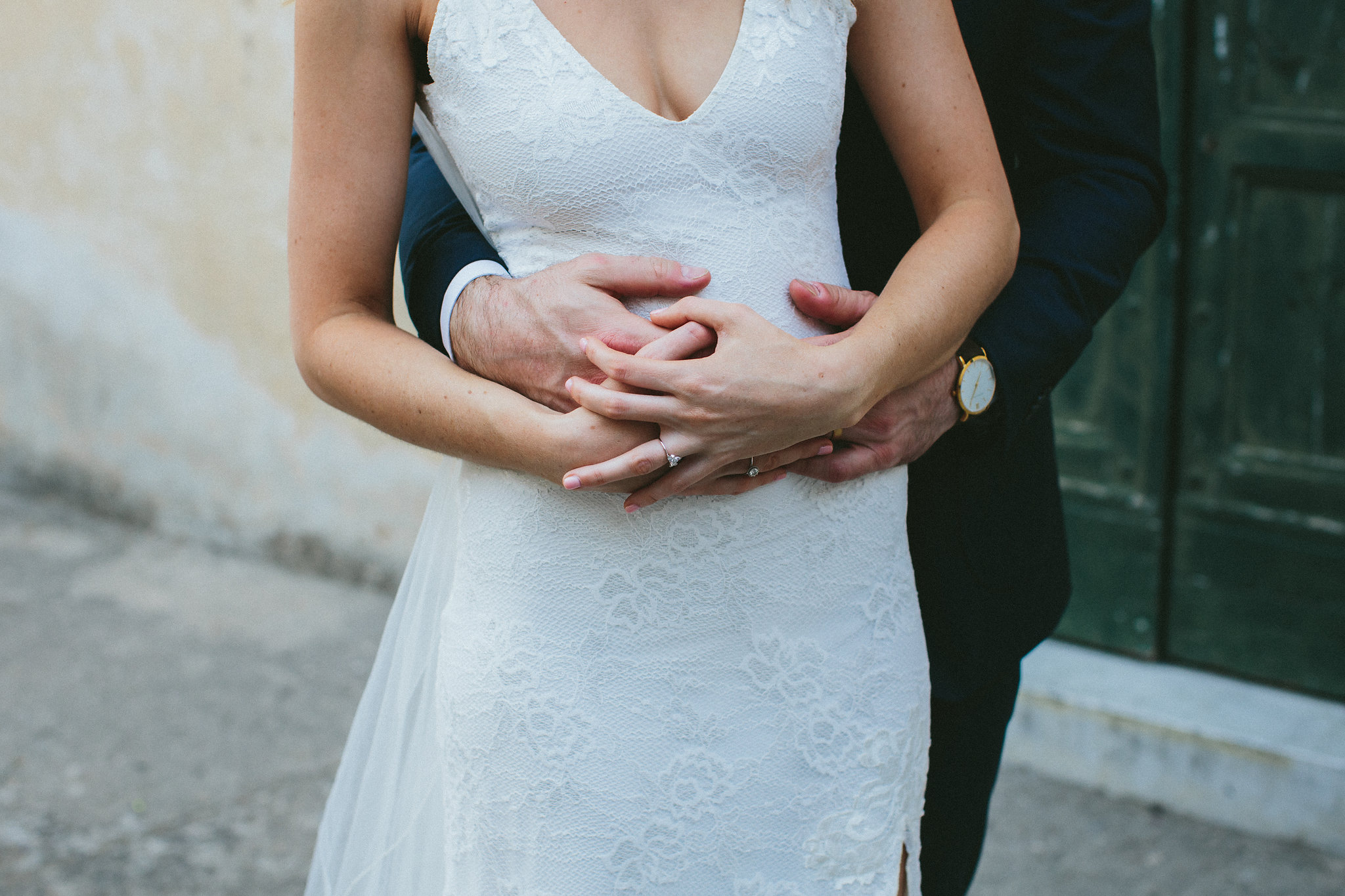 hands of groom and his bride