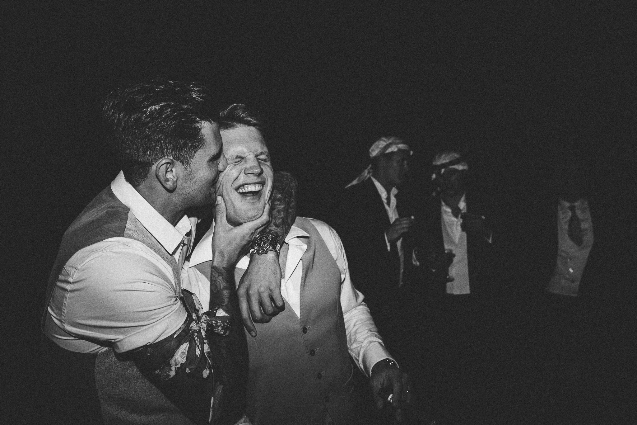 A french destination wedding groom and best man