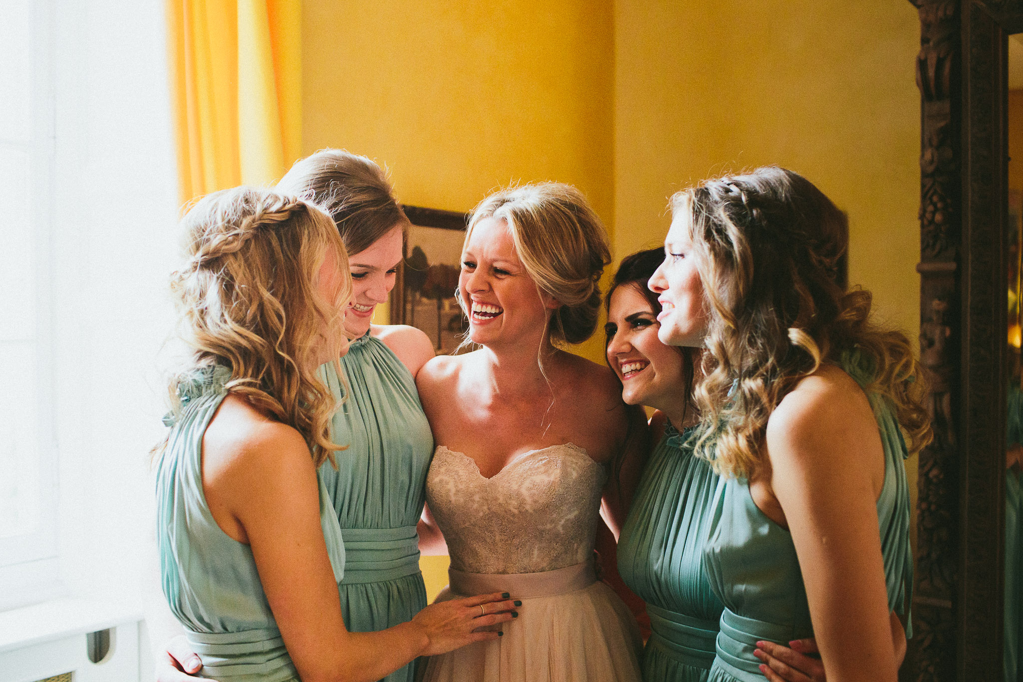 happy bride and her bridesmaids