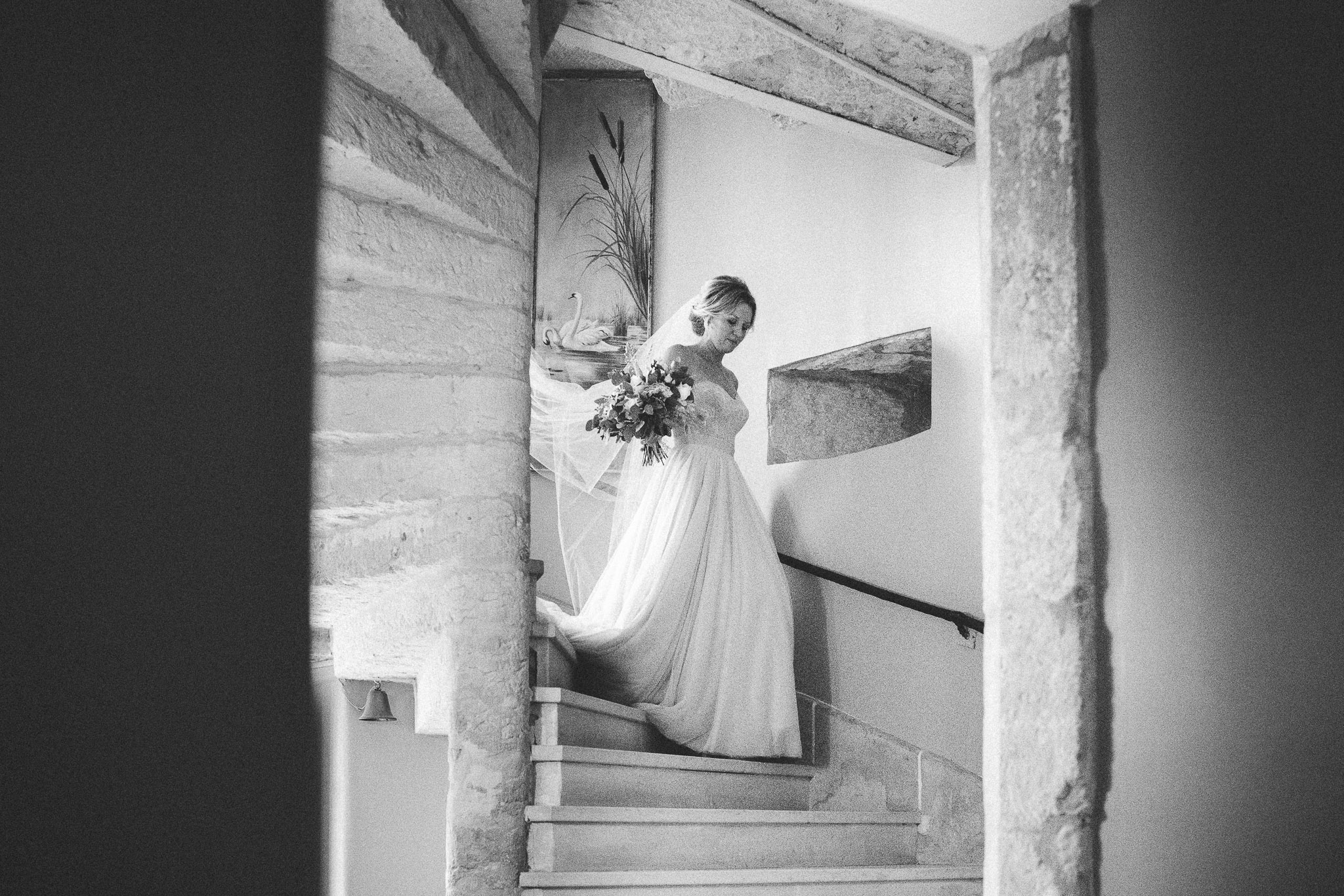 bride walking down stairs 