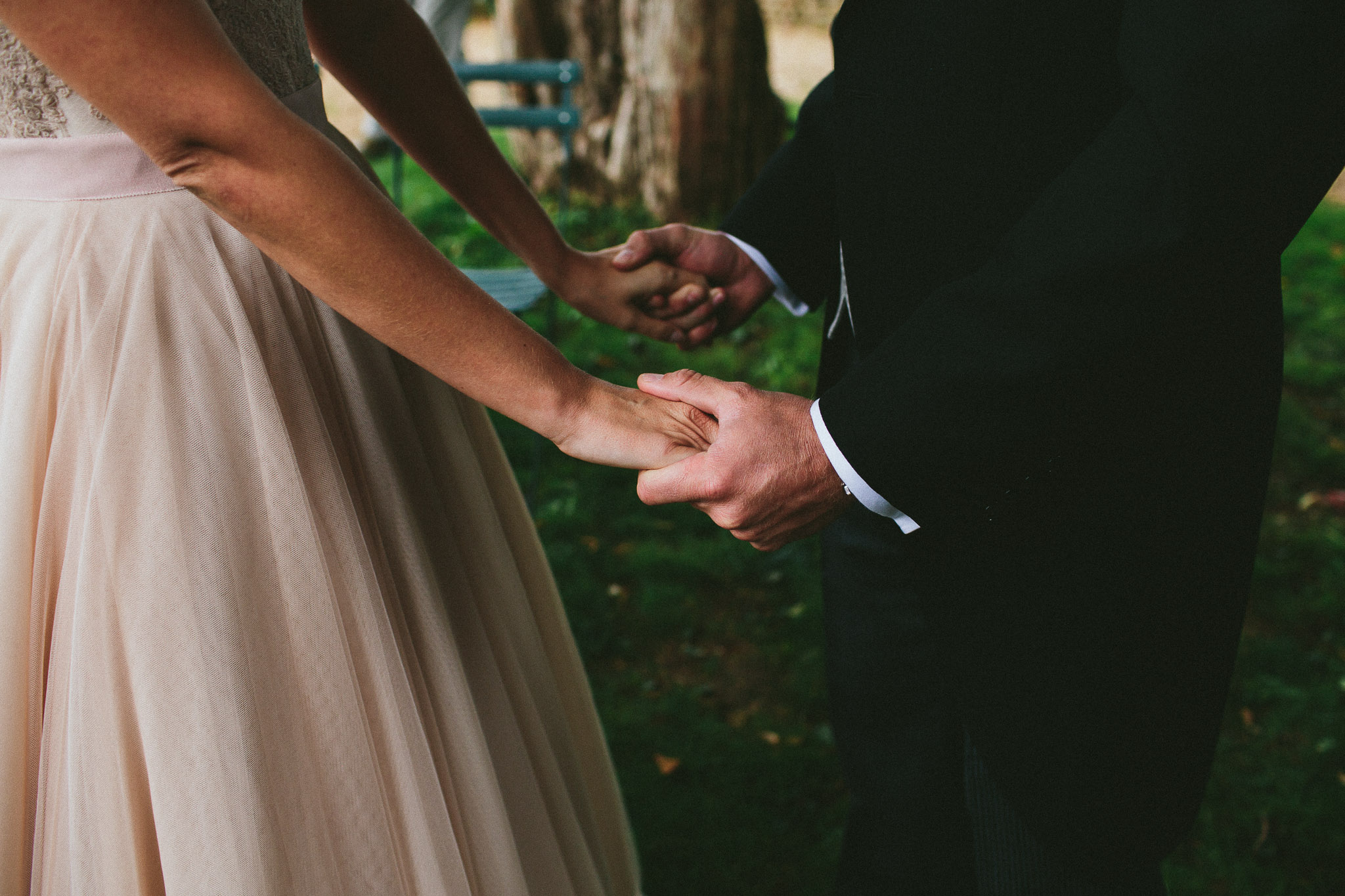 bride and groom holding hands wedding ceremony