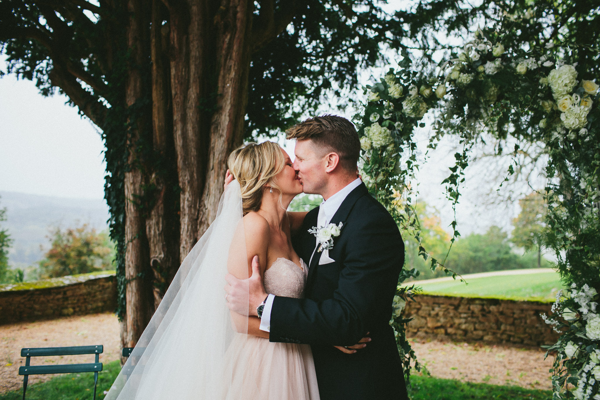 A french destination wedding ceremony kiss
