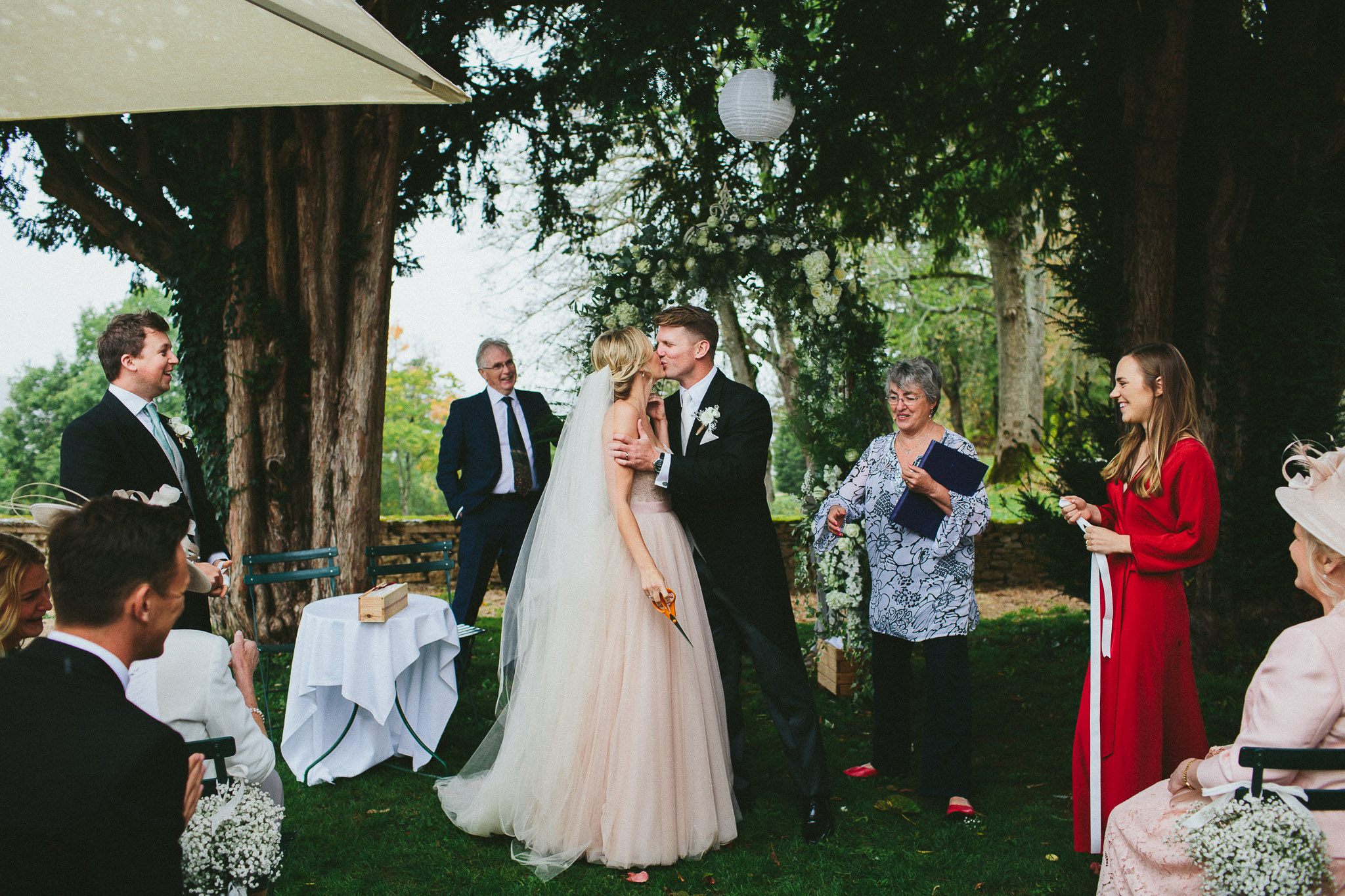 A french destination wedding kiss 