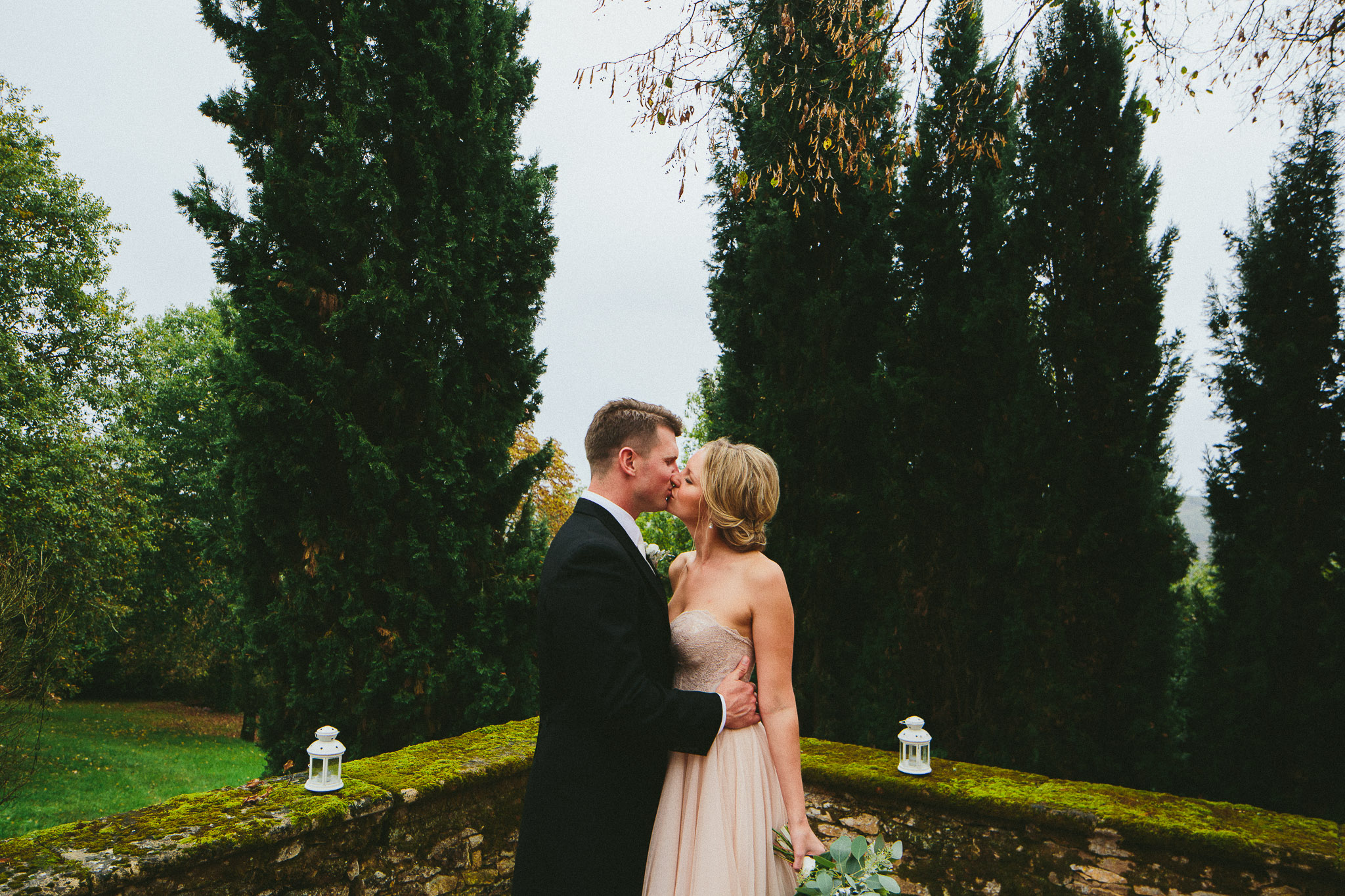 A french destination wedding kiss during shoot session bride and groom in france