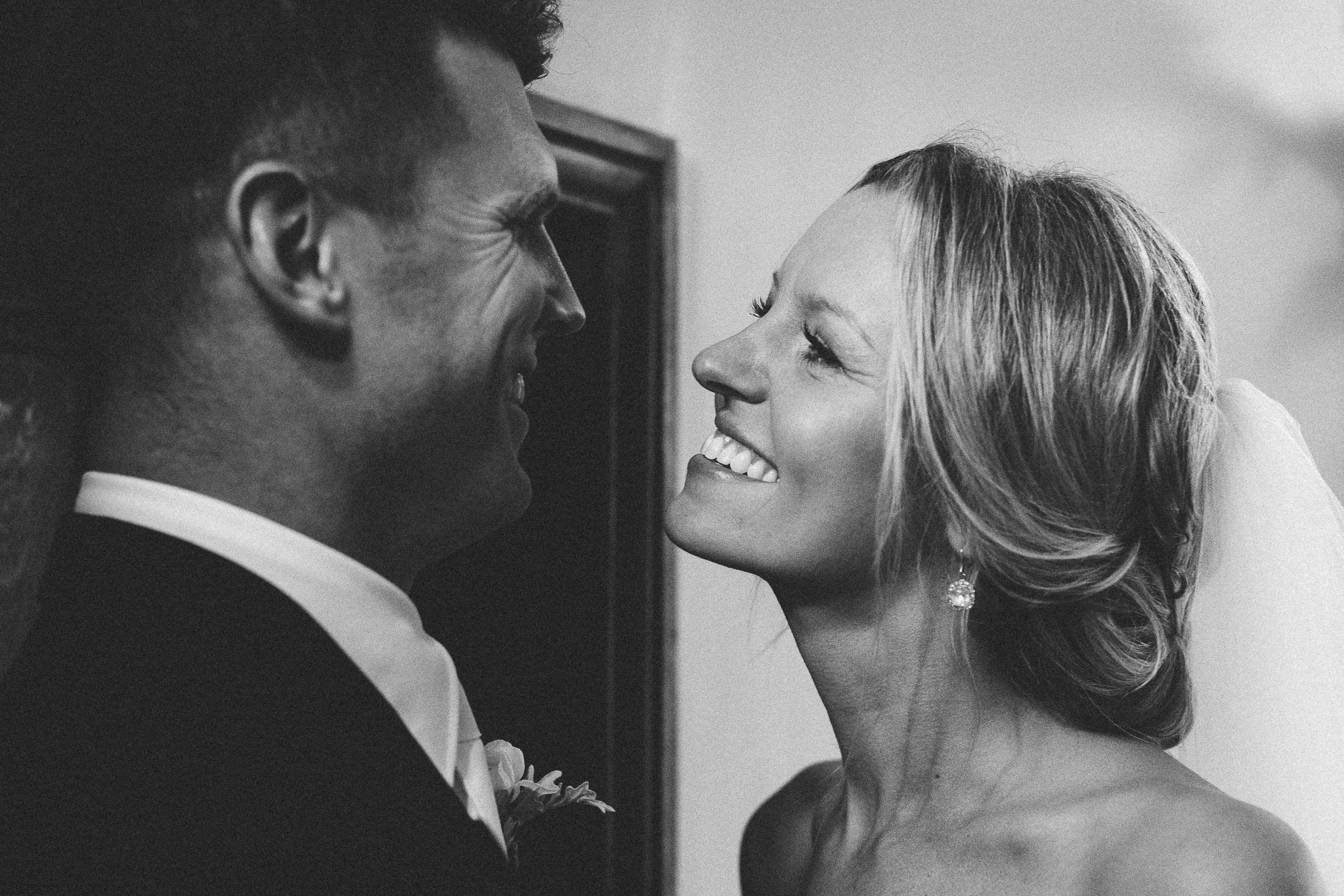 A french destination wedding bride and groom smiling photo session