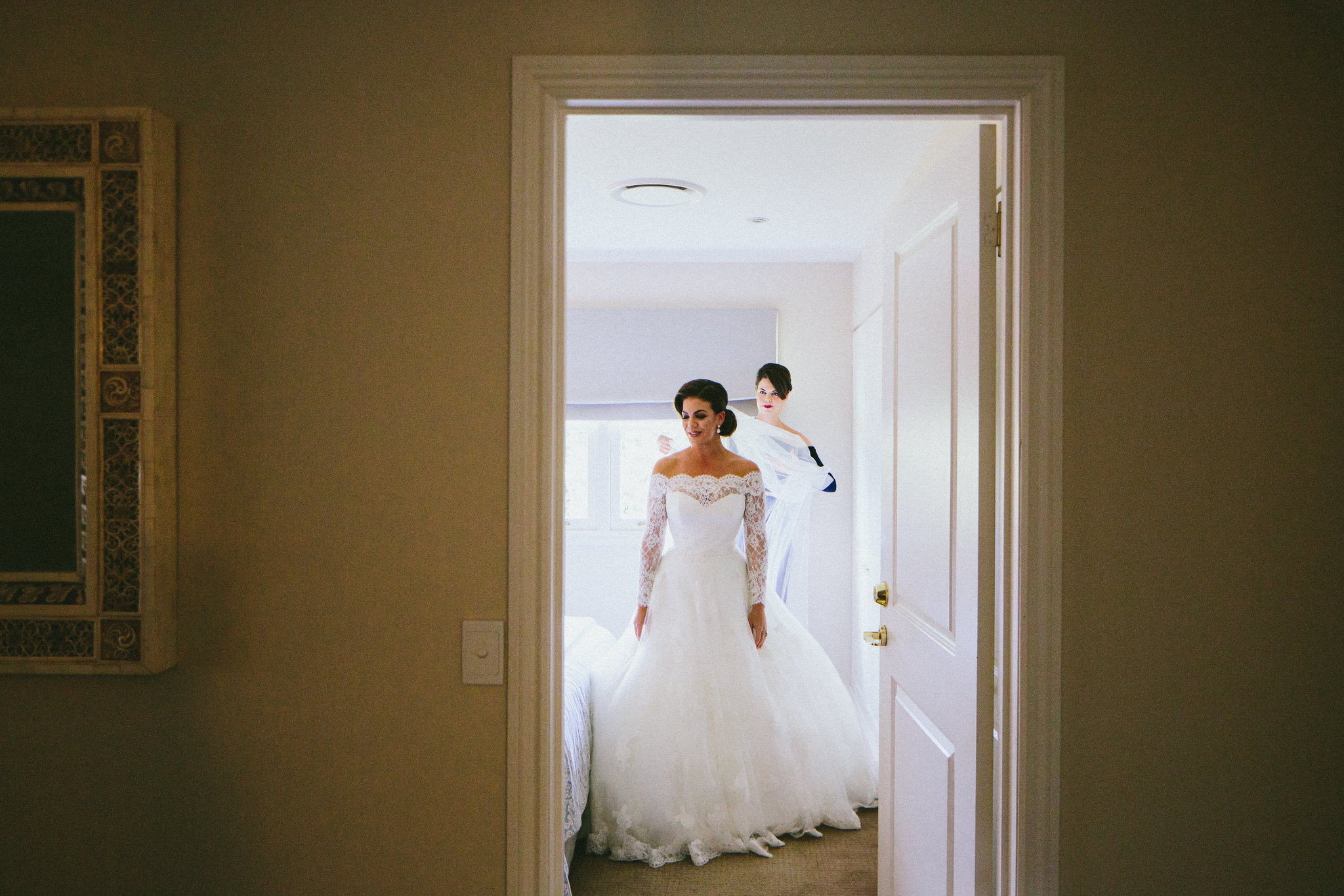 Bride and her sister getting ready wedding