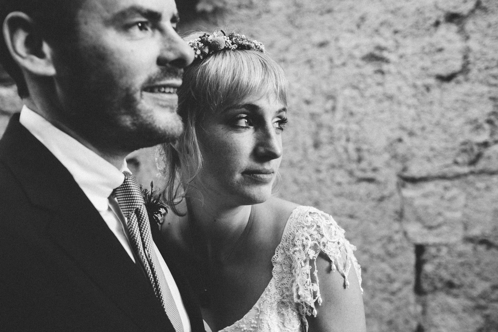 bride and groom looking into the distance