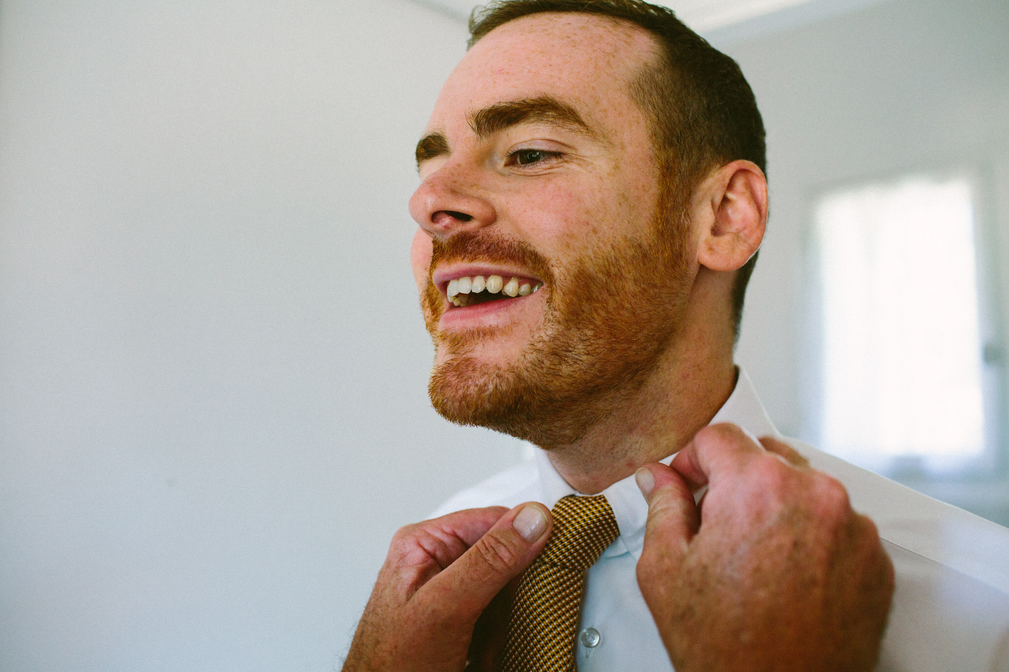 groom french wedding tie on