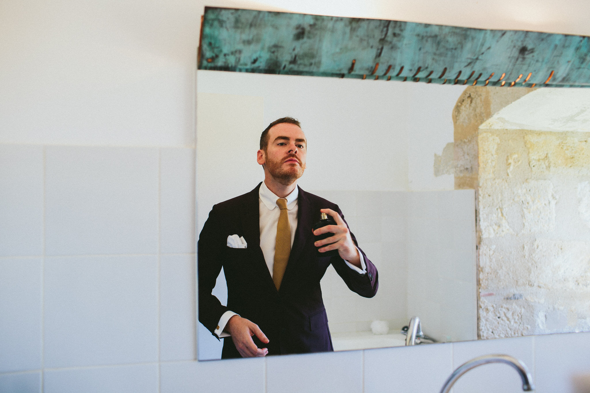 groom french wedding perfume on