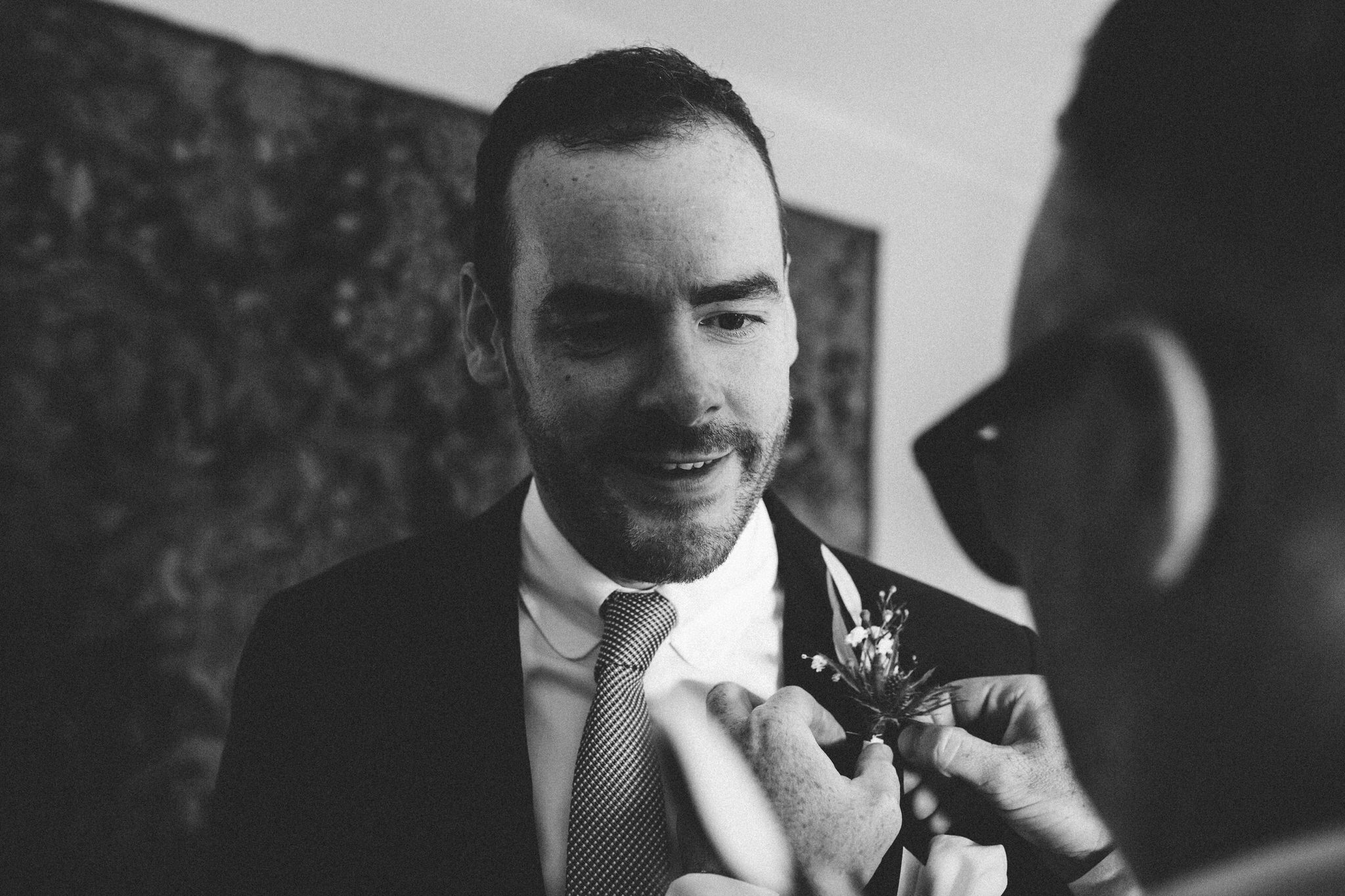 groom buttonhole flowers and boutonnieres