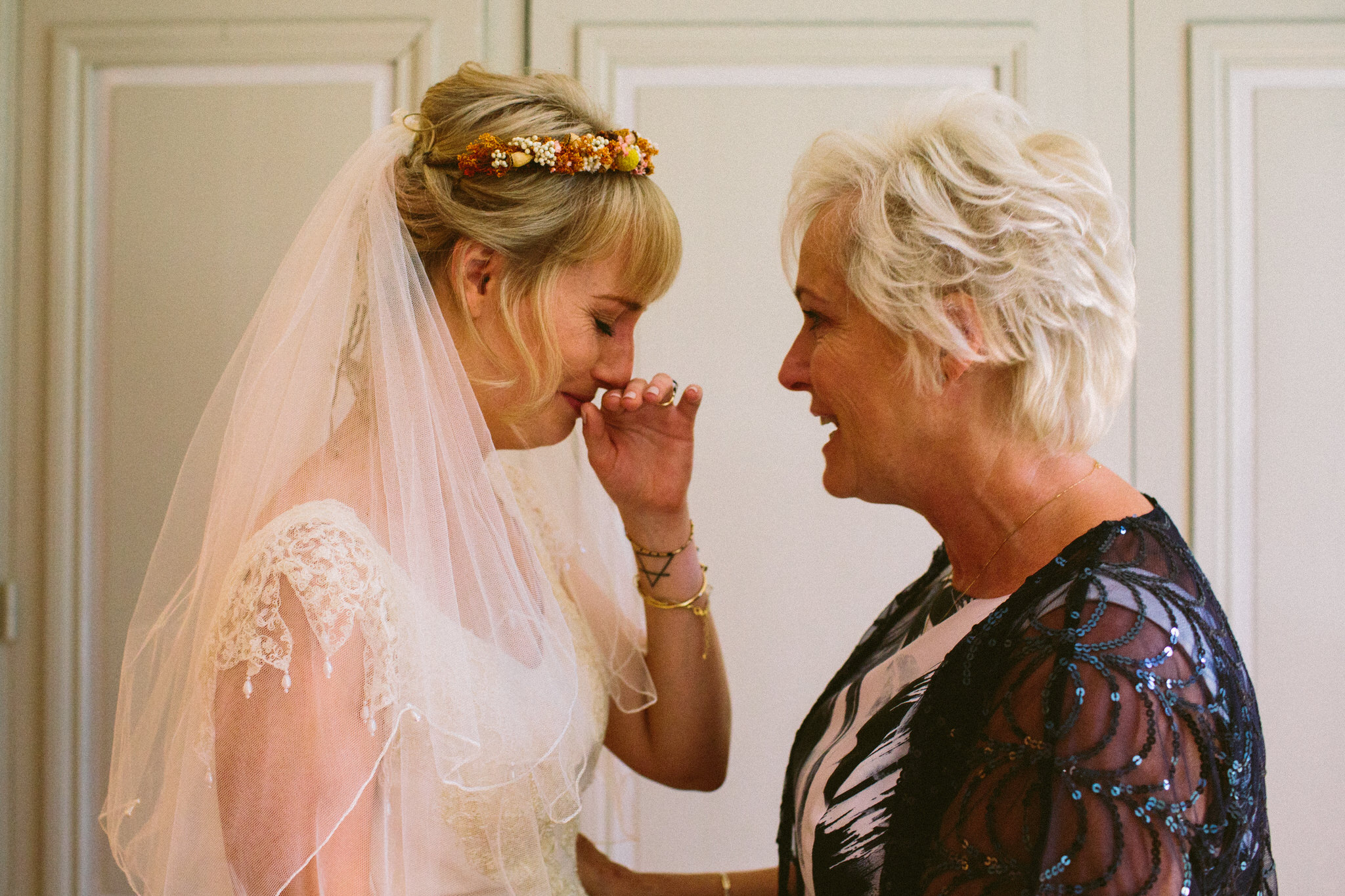 brides and mother of the bride emotional moment french wedding