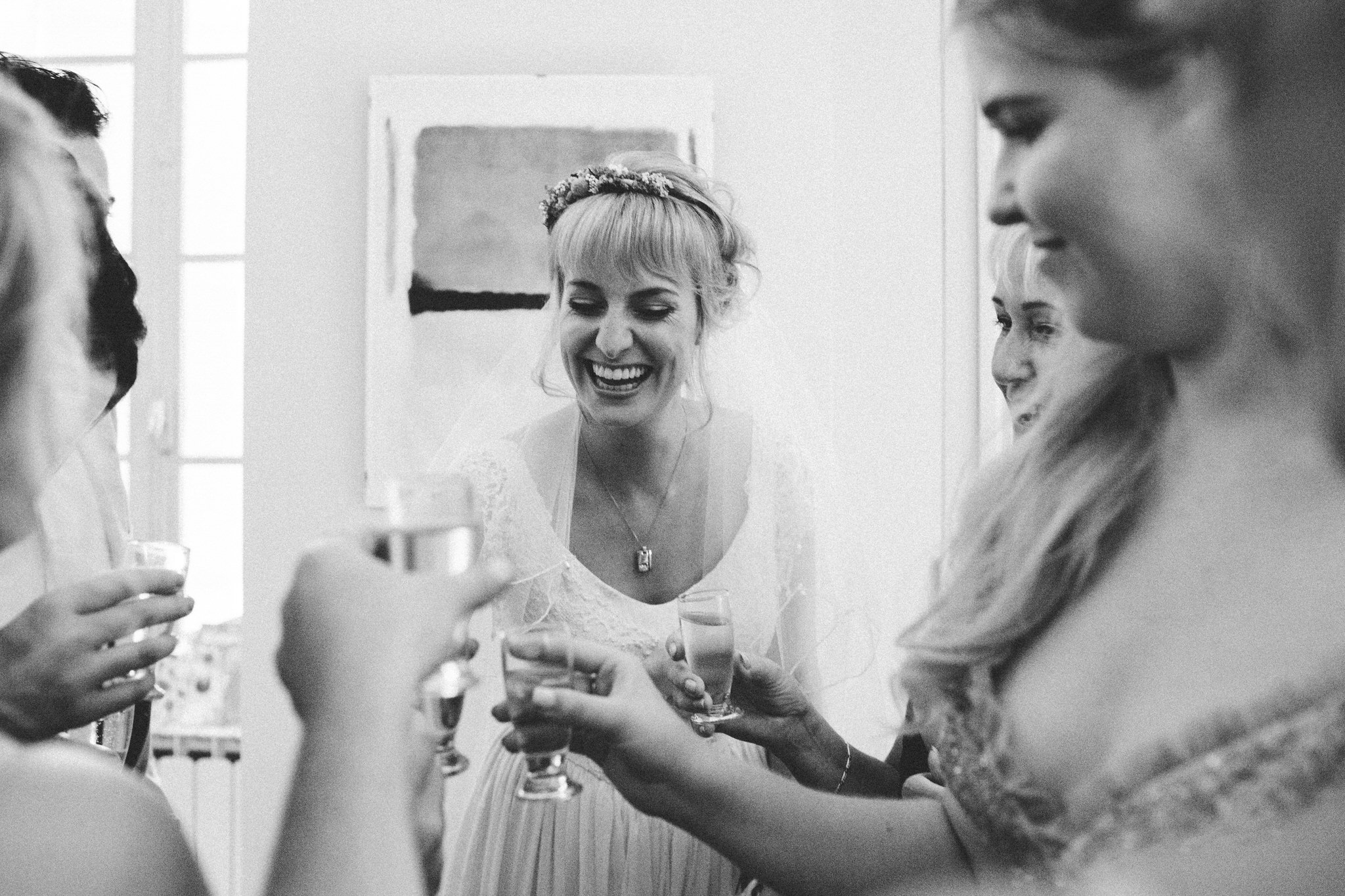brides and bridesmaids toast laughs french wedding
