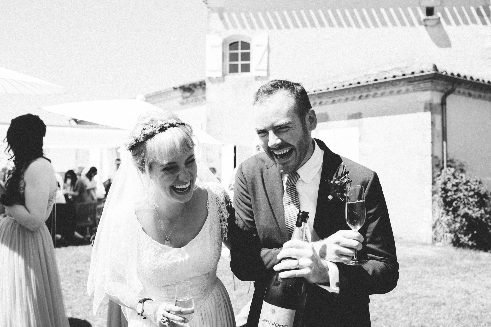 newly weds champagne and laughs french wedding